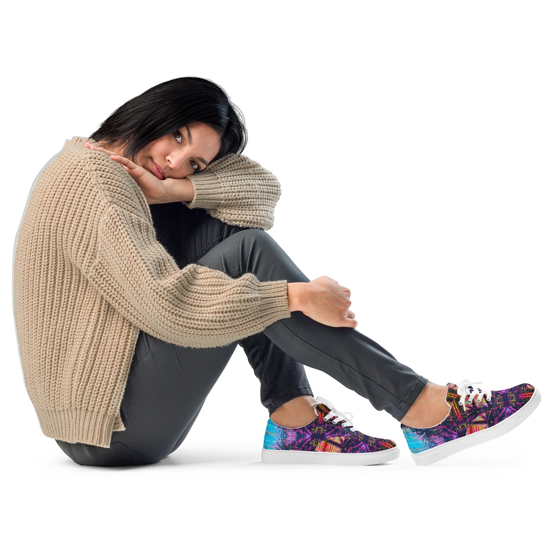 Close lifestyle view of a woman wearing colourful printed Barcelona canvas shoes with white soles and laces