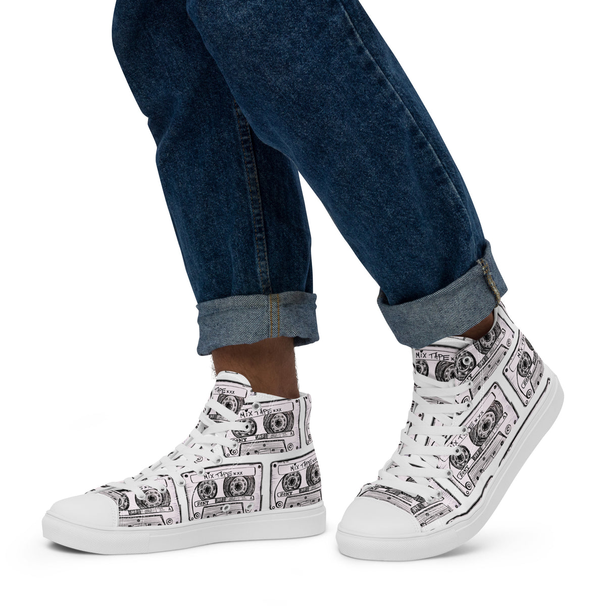 Vicky Steane Apparel's Mix Tape High Top Canvas Shoes worn with rolled-up jeans on a white background
