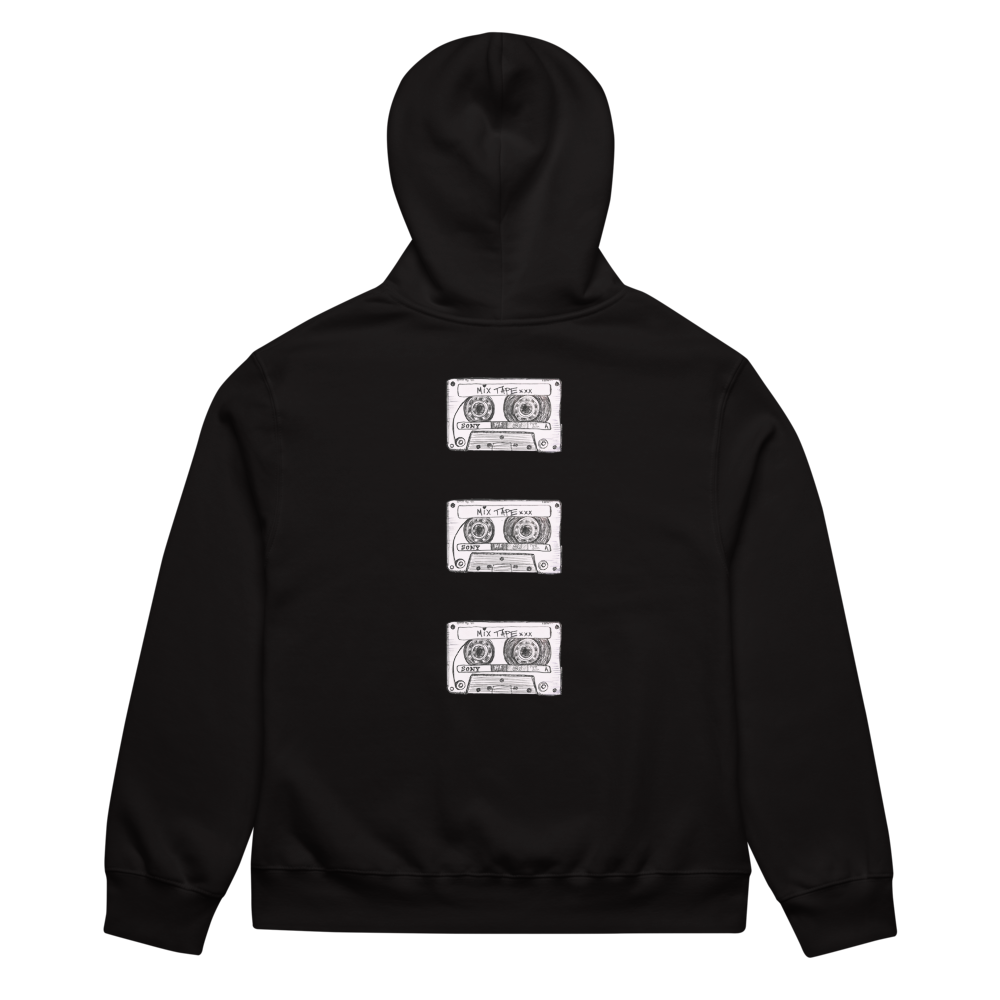 Flat lay image of the Mix Tape Oversized Hoody in black with cassette tape designs on the back against a plain background