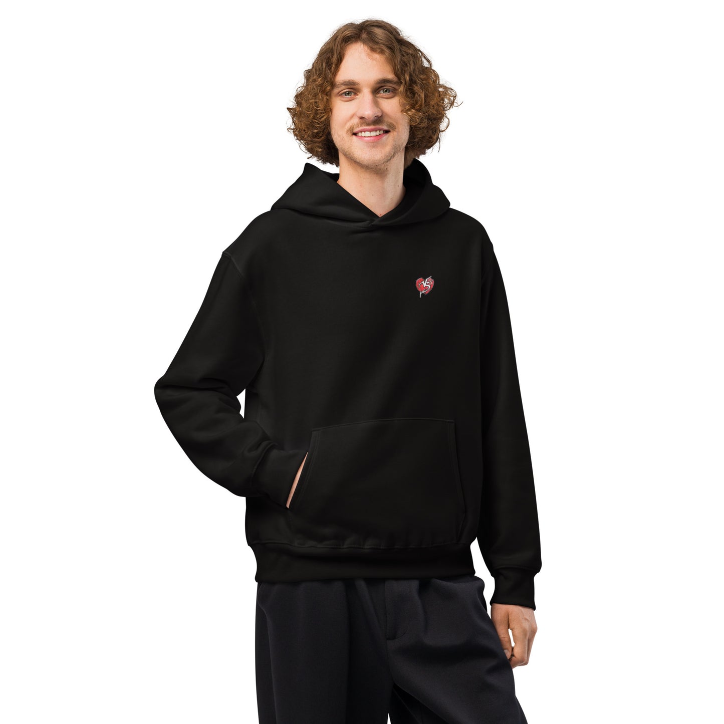 Male model wearing a Mix Tape Oversized Hoody in black with Vicky Steane heart logo on breast, on a white background