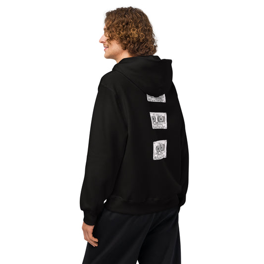 Model wearing the Mix Tape Oversized Hoodie in black with white designs on the back against a white background, facing away to the left